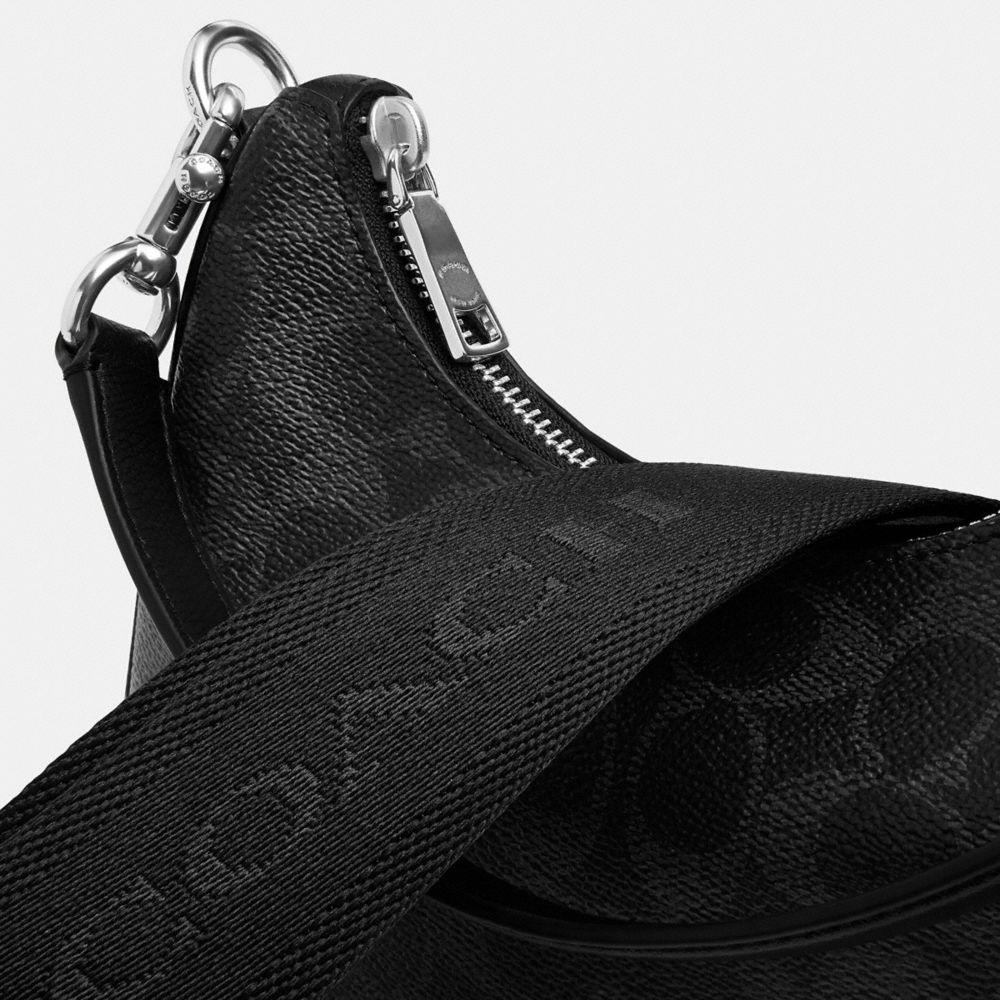 NOLAN HOBO BAG IN SIGNATURE CANVAS