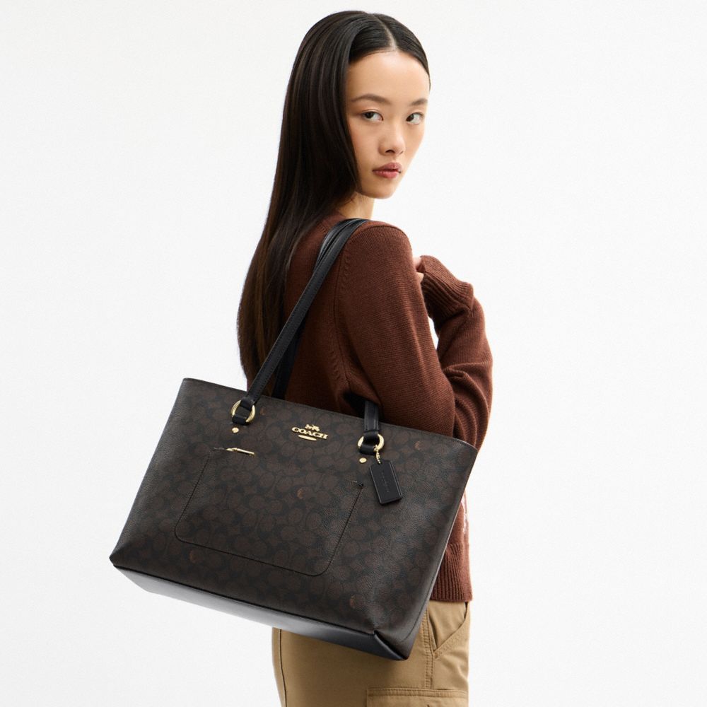 STATION TOTE BAG IN SIGNATURE CANVAS