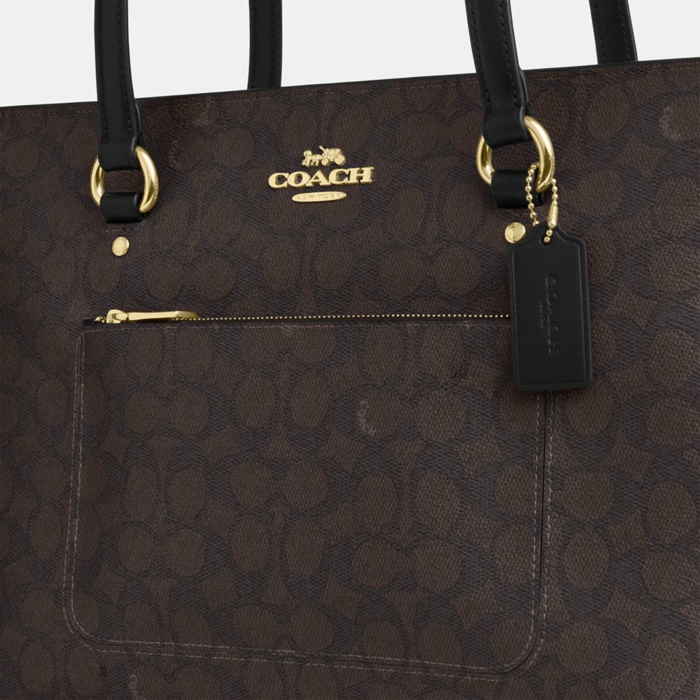 STATION TOTE BAG IN SIGNATURE CANVAS