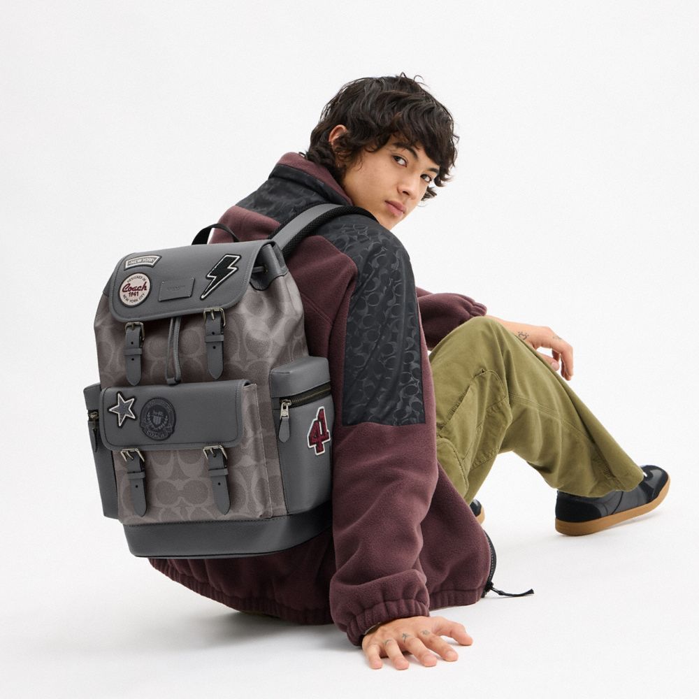 SPRINT BACKPACK IN MAXI SIGNATURE CANVAS WITH PATCHES