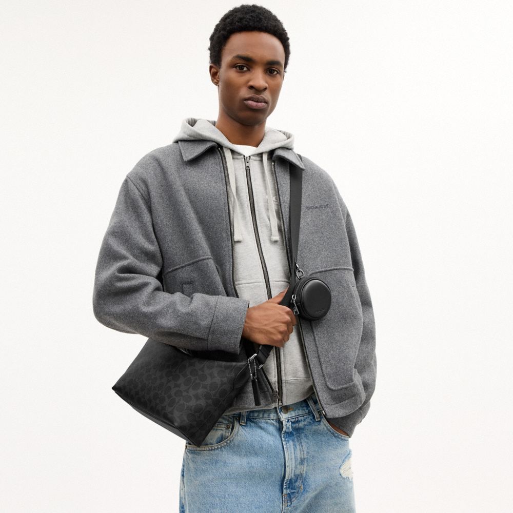 SMALL FINN CROSSBODY BAG WITH POUCH IN SIGNATURE CANVAS