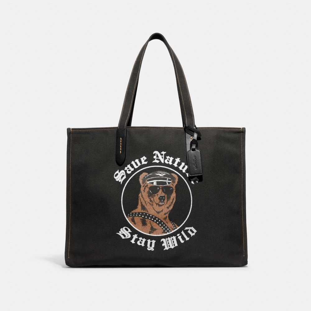 COACH CD711 Tote 42 In 100 Percent Recycled Canvas With Bear Graphic Brass/Black