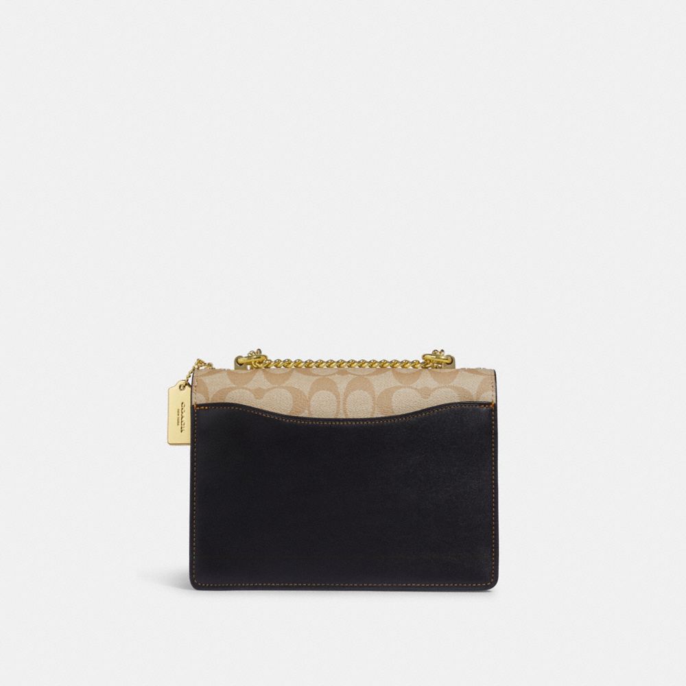 KLARE CROSSBODY IN BLOCKED SIGNATURE CANVAS