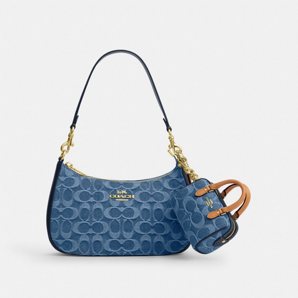 MINI ROWAN BAG CHARM IN SIGNATURE DENIM