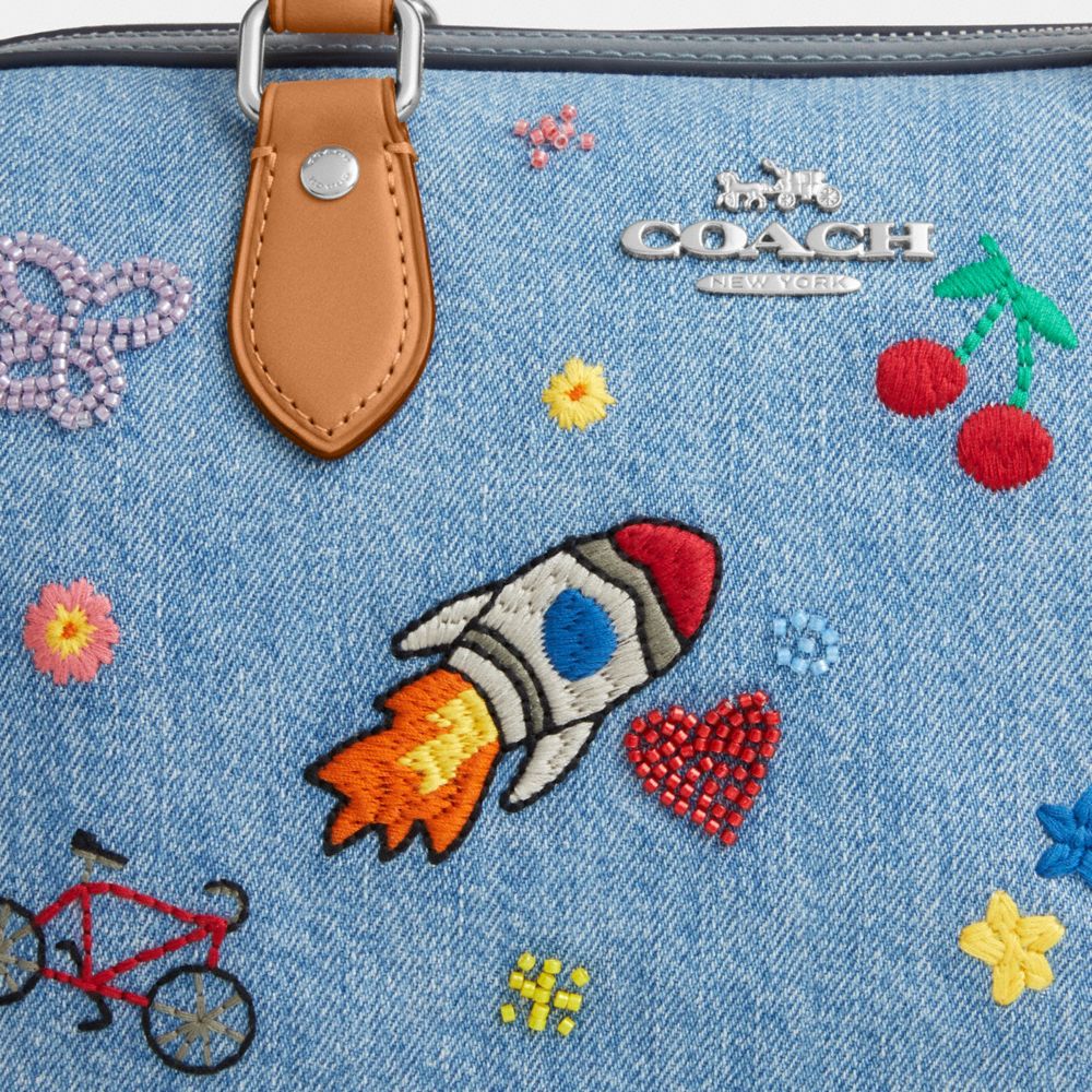 ROWAN SATCHEL BAG IN SIGNATURE DENIM WITH PATCHES AND EMBROIDERY