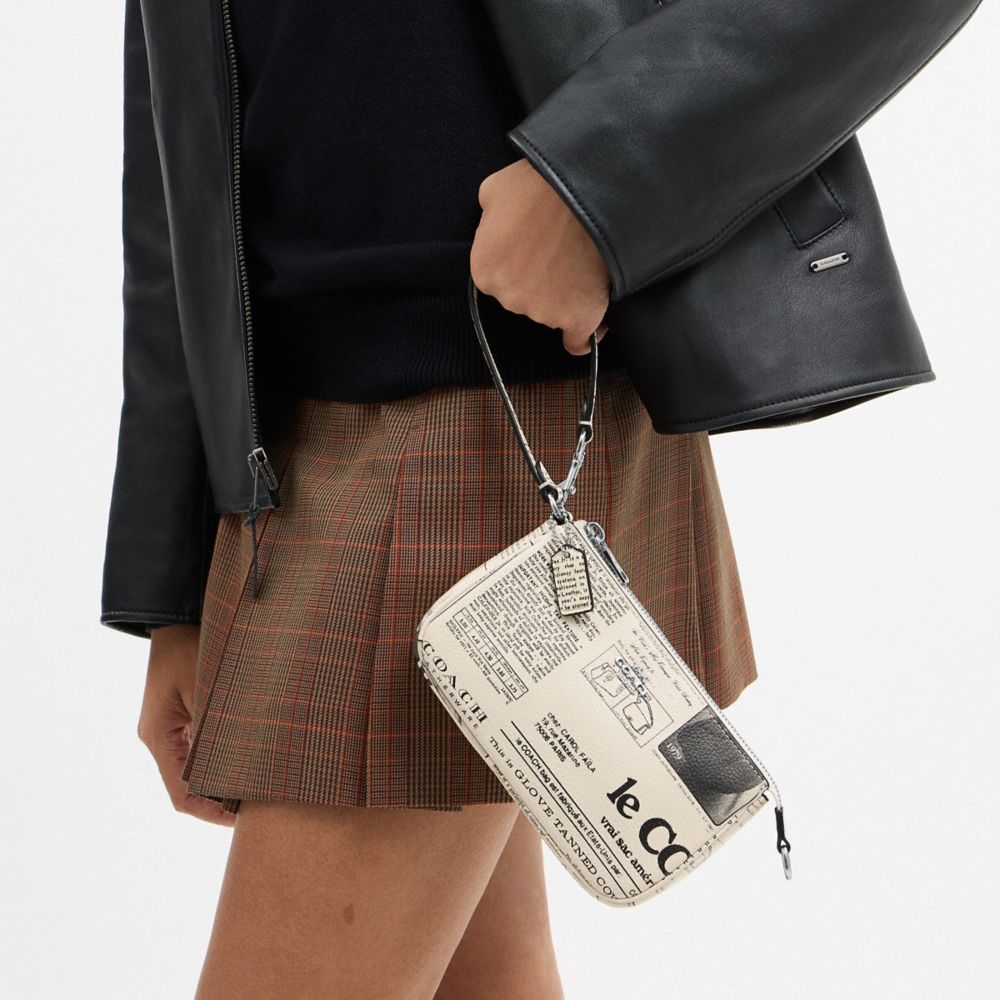 NOLITA 19 WITH NEWSPAPER PRINT