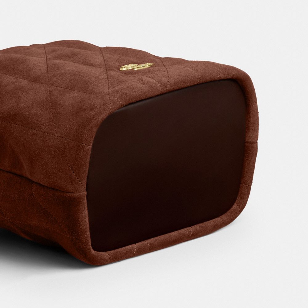 FAYE 絎縫細節迷你拉繩包