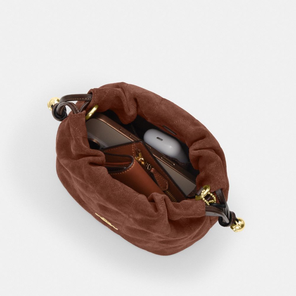 FAYE 絎縫細節迷你拉繩包