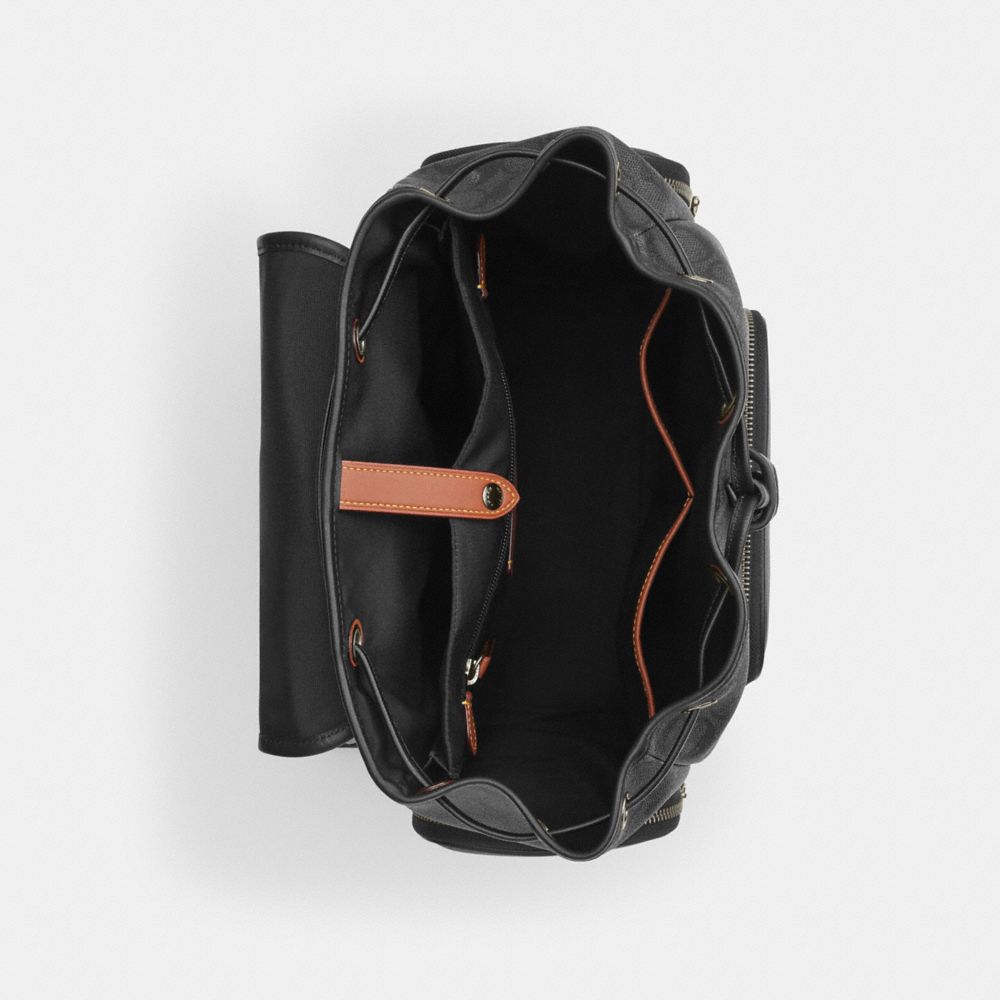FINN BACKPACK IN SIGNATURE CANVAS