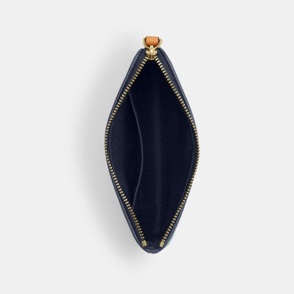 CORNER ZIP WRISTLET IN SIGNATURE DENIM