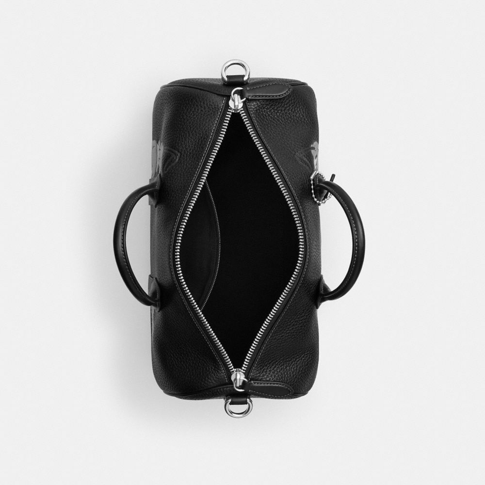 COMPASS DISNEY X COACH 布魯托圖案 35 手袋