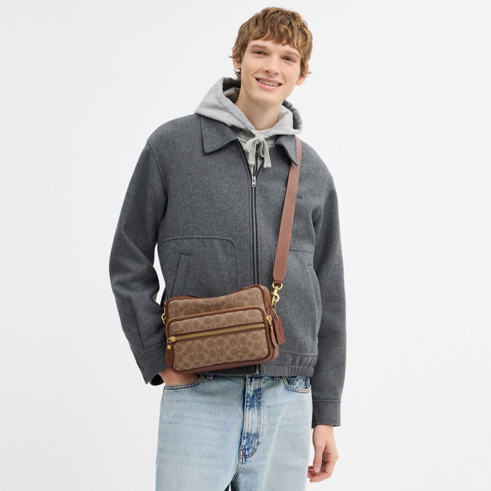 DAKOTA CROSSBODY BAG IN SIGNATURE CANVAS