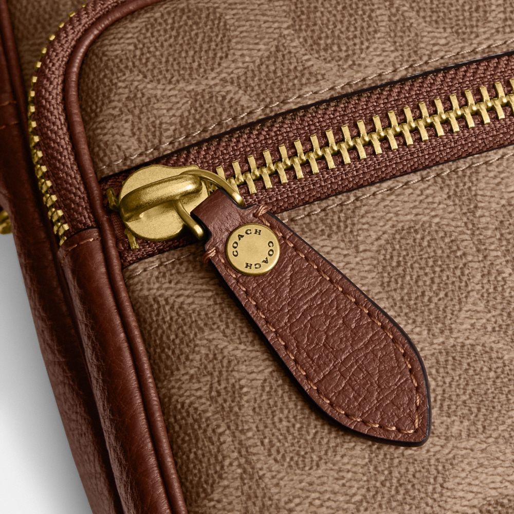 DAKOTA CROSSBODY BAG IN SIGNATURE CANVAS