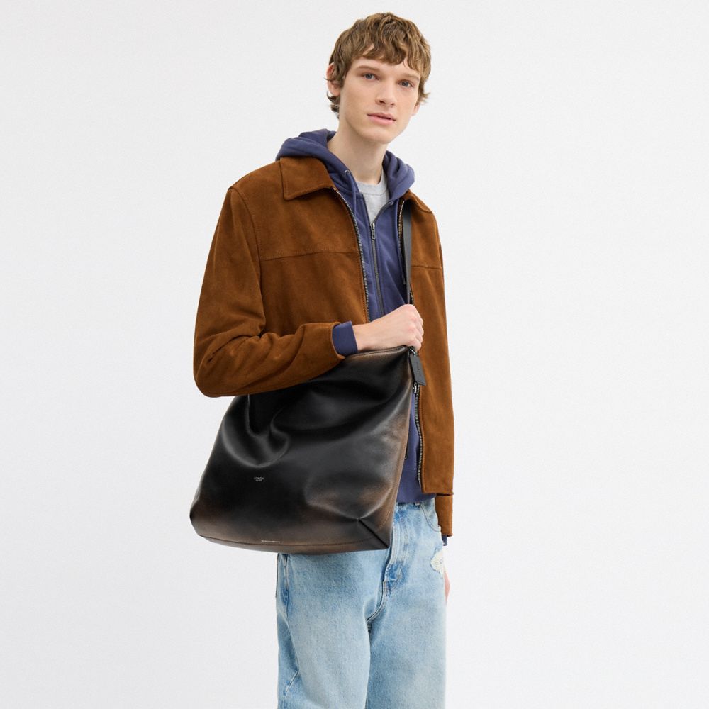 MOTT MESSENGER BAG IN LOVED LEATHER