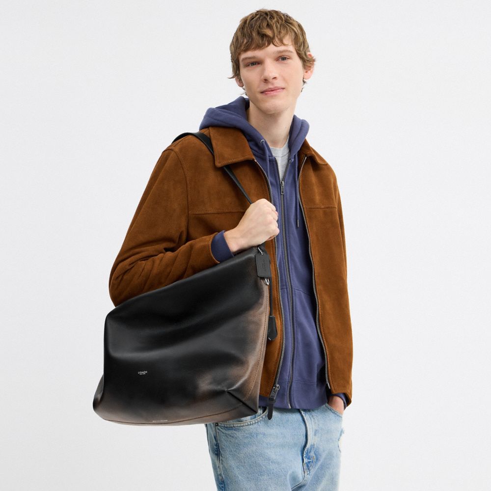 MOTT MESSENGER BAG IN LOVED LEATHER