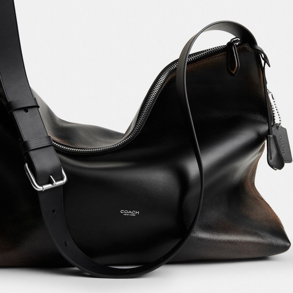 MOTT MESSENGER BAG IN LOVED LEATHER