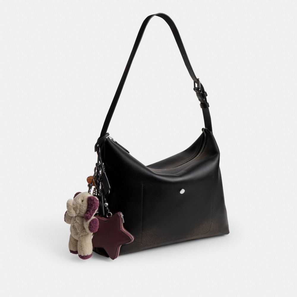 MOTT MESSENGER BAG 38 IN LOVED LEATHER WITH CHARMS