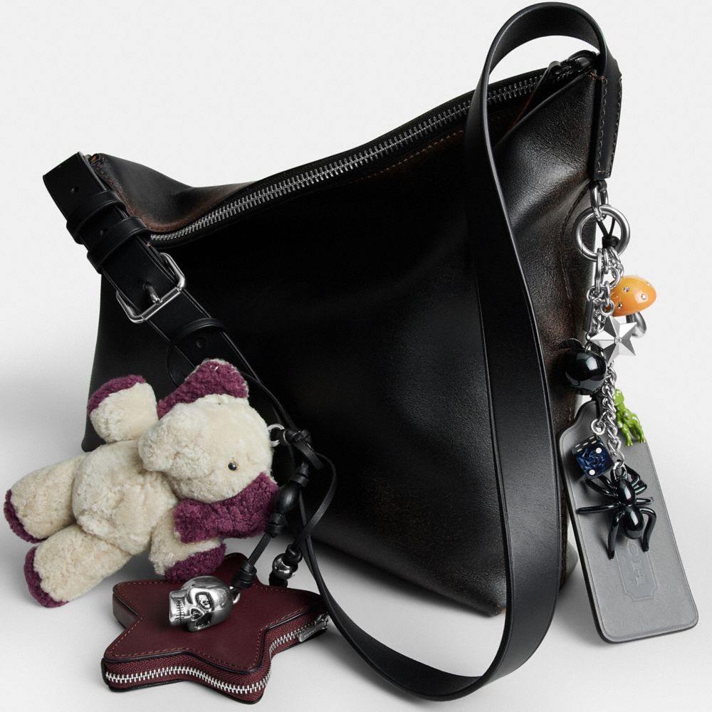 MOTT MESSENGER BAG 38 IN LOVED LEATHER WITH CHARMS