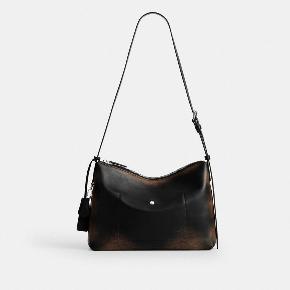 MOTT MESSENGER BAG 33 IN LOVED LEATHER