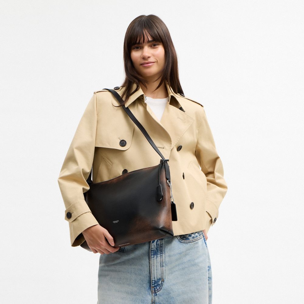 MOTT MESSENGER BAG 33 IN LOVED LEATHER