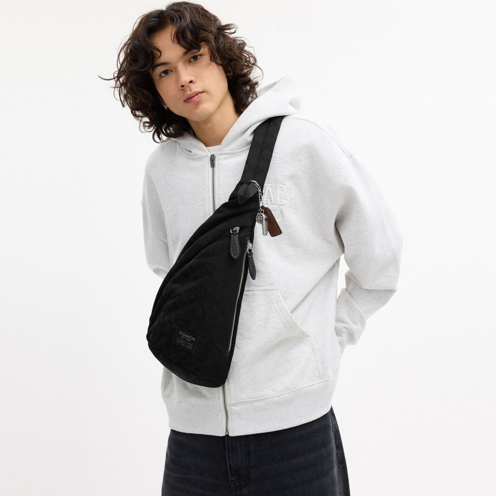 LACHLAN SLING IN SIGNATURE NYLON