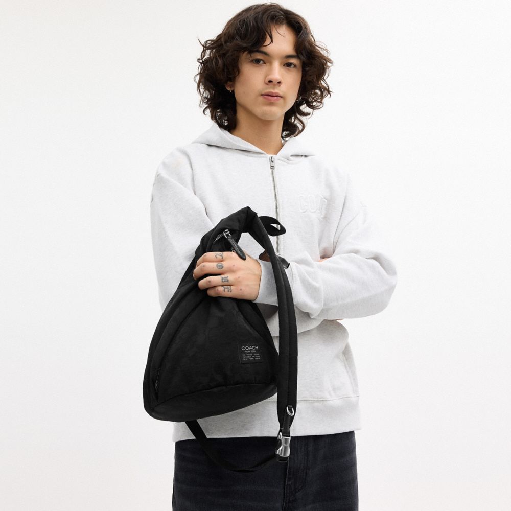 LACHLAN SLING IN SIGNATURE NYLON