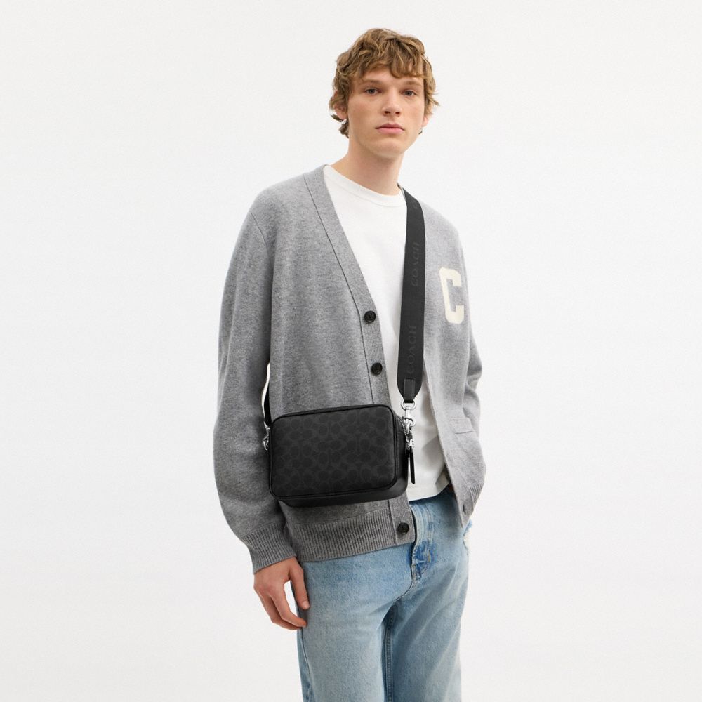 RADIO CAMERA BAG IN SIGNATURE CANVAS