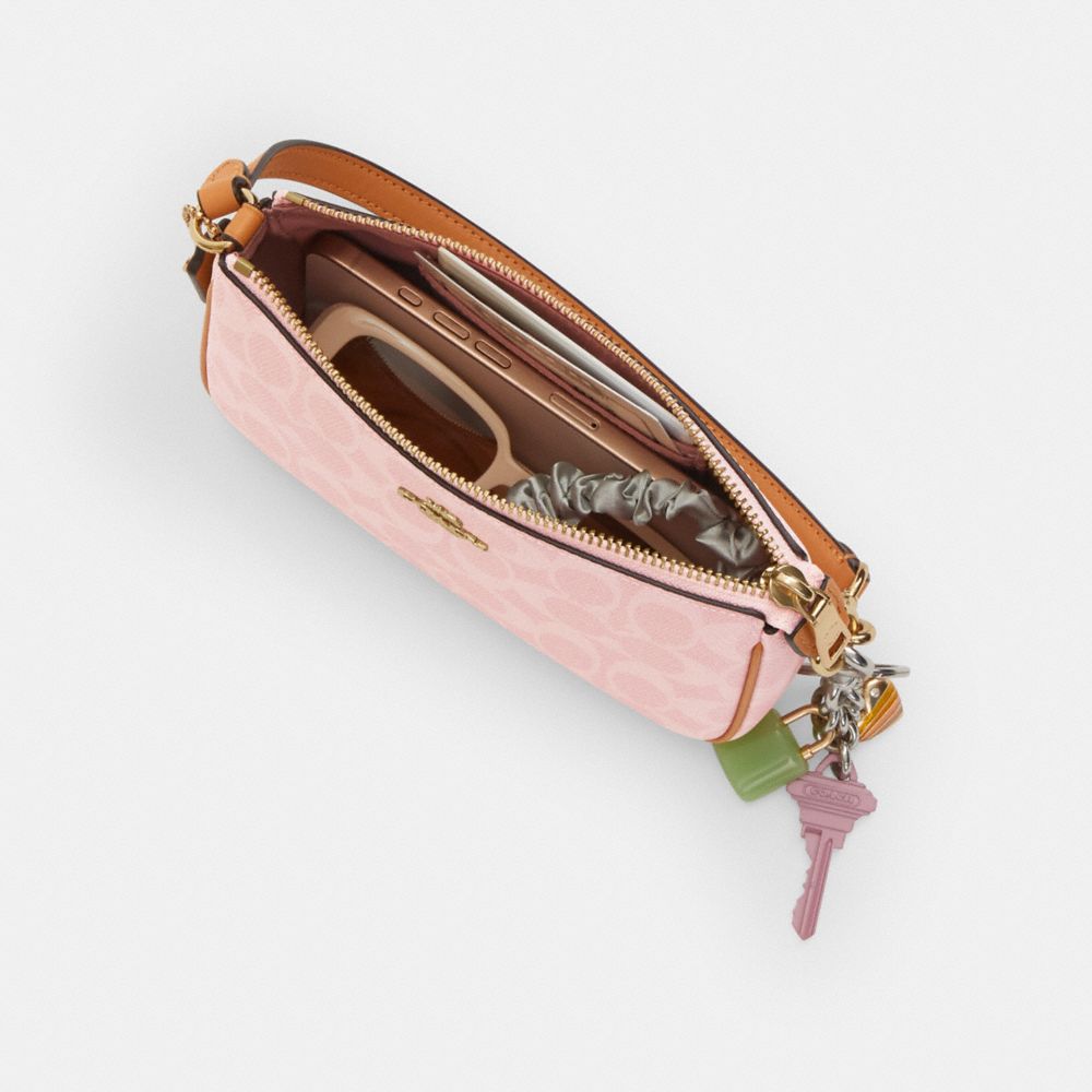 NOLITA 19 IN SIGNATURE CANVAS WITH CHARMS
