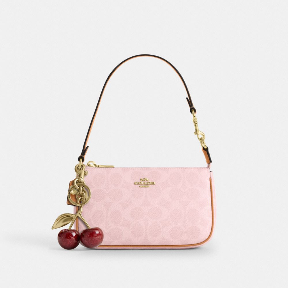 NOLITA 19 IN SIGNATURE CANVAS WITH CHARMS
