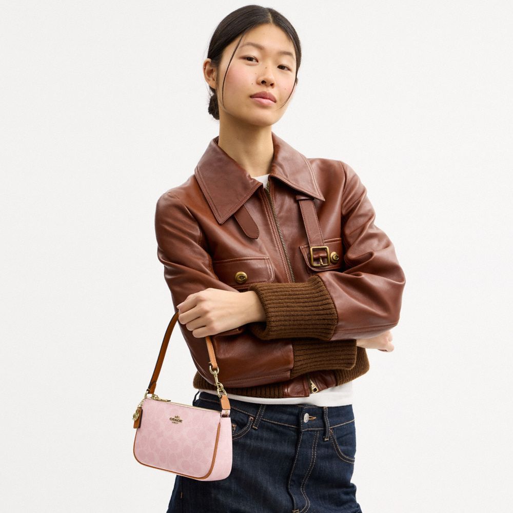 NOLITA 19 IN SIGNATURE CANVAS WITH CHARMS
