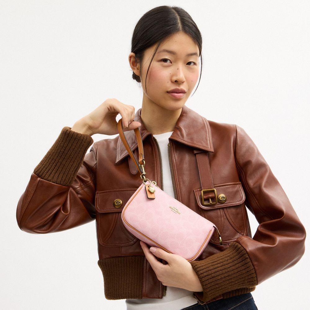 NOLITA 19 IN SIGNATURE CANVAS WITH CHARMS