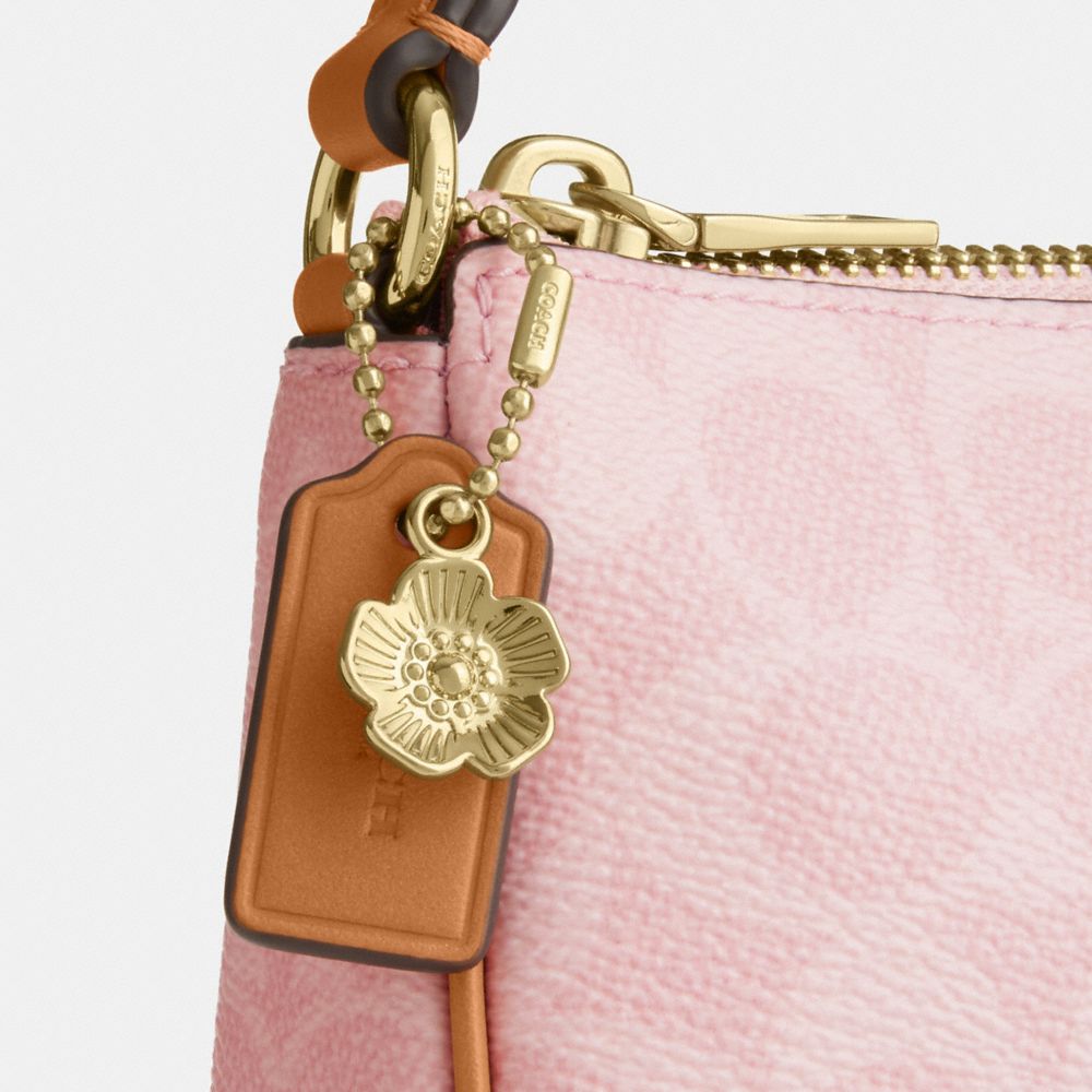 NOLITA 19 IN SIGNATURE CANVAS WITH CHARMS