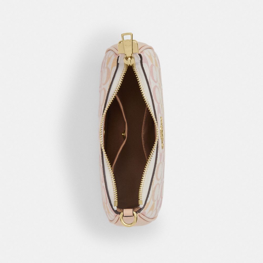 TERI MINI CROSSBODY BAG IN PRETTY SIGNATURE CANVAS