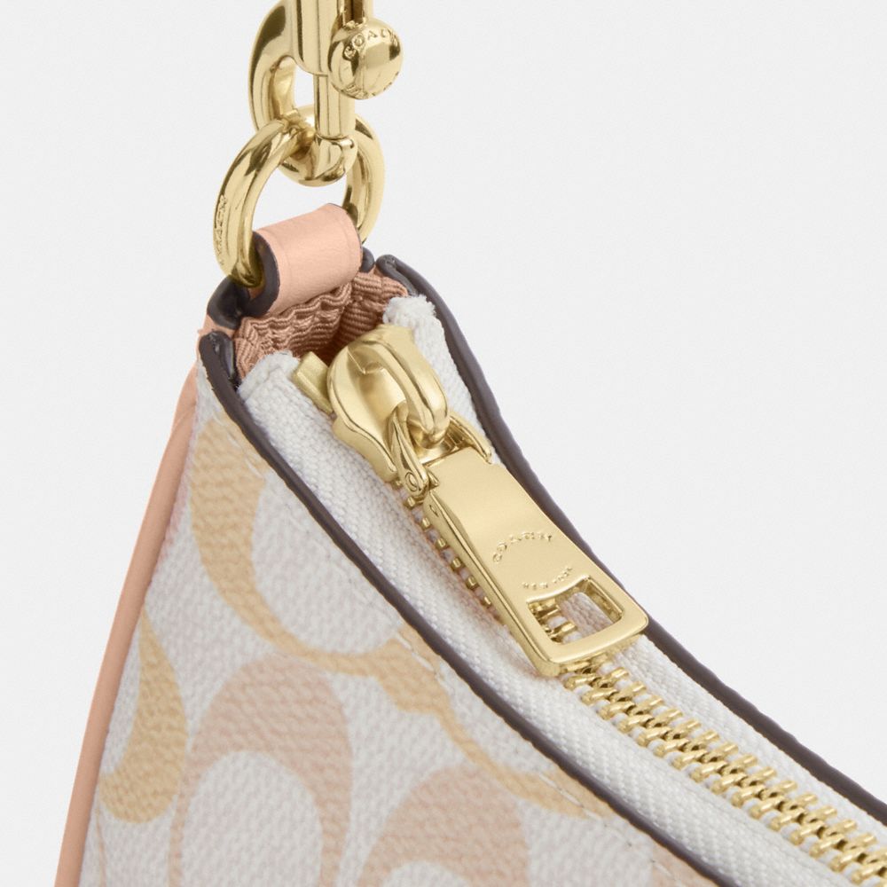 TERI MINI CROSSBODY BAG IN PRETTY SIGNATURE CANVAS