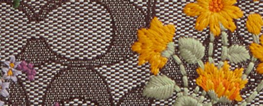 TERI MINI CROSSBODY BAG IN SIGNATURE JACQUARD WITH FLORAL EMBROIDERY