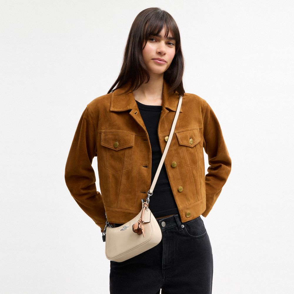 TERI MINI CROSSBODY BAG WITH CHARMS