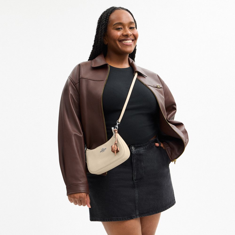 TERI MINI CROSSBODY BAG WITH CHARMS
