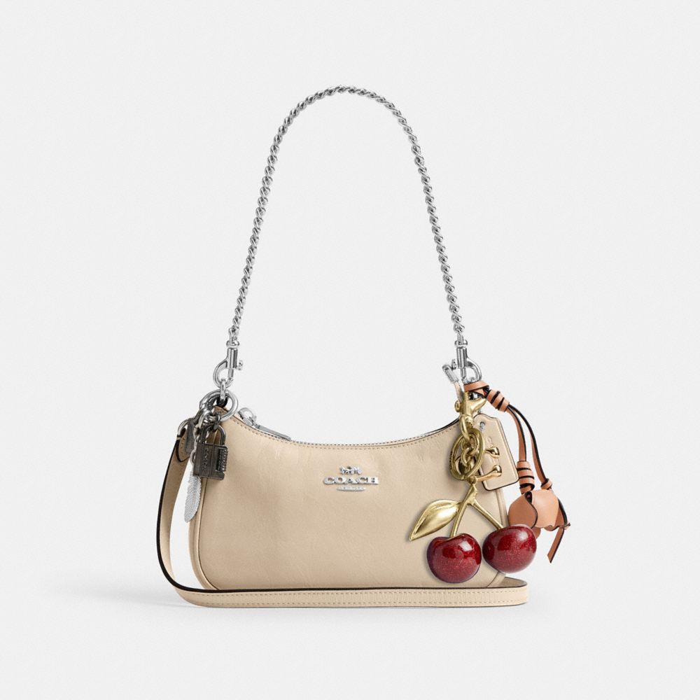 TERI MINI CROSSBODY BAG WITH CHARMS