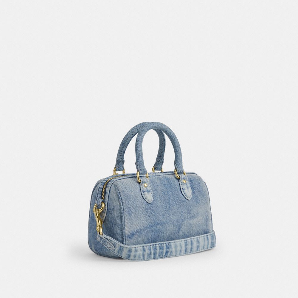 MINI ROWAN CROSSBODY BAG IN LOVED DENIM WITH CHARMS