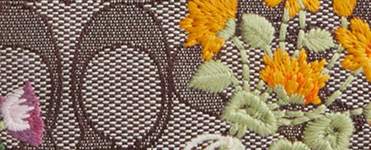 MINI ROWAN CROSSBODY BAG IN SIGNATURE JACQUARD WITH FLORAL EMBROIDERY