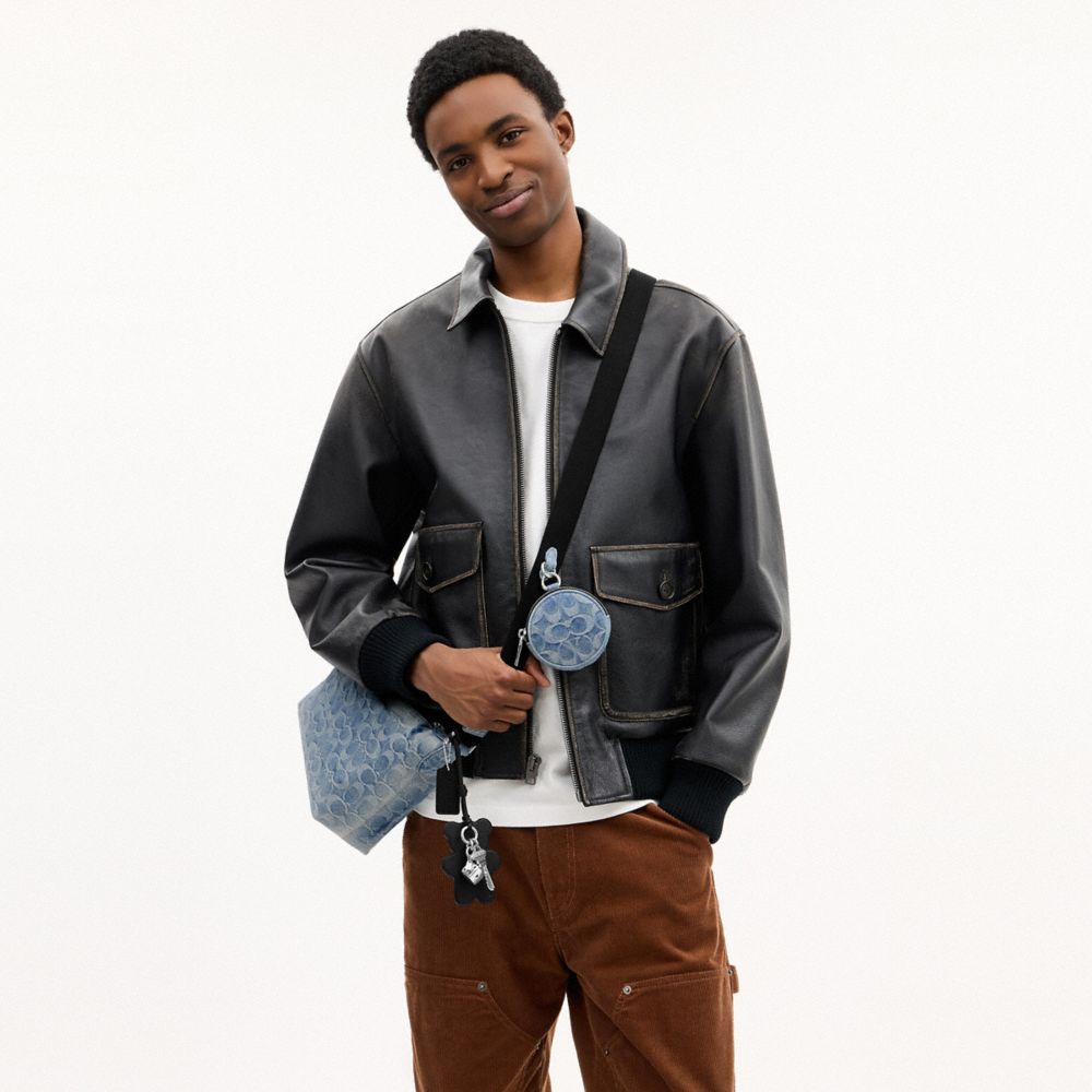 SMALL FINN CROSSBODY WITH POUCH IN LOVED SIGNATURE DENIM