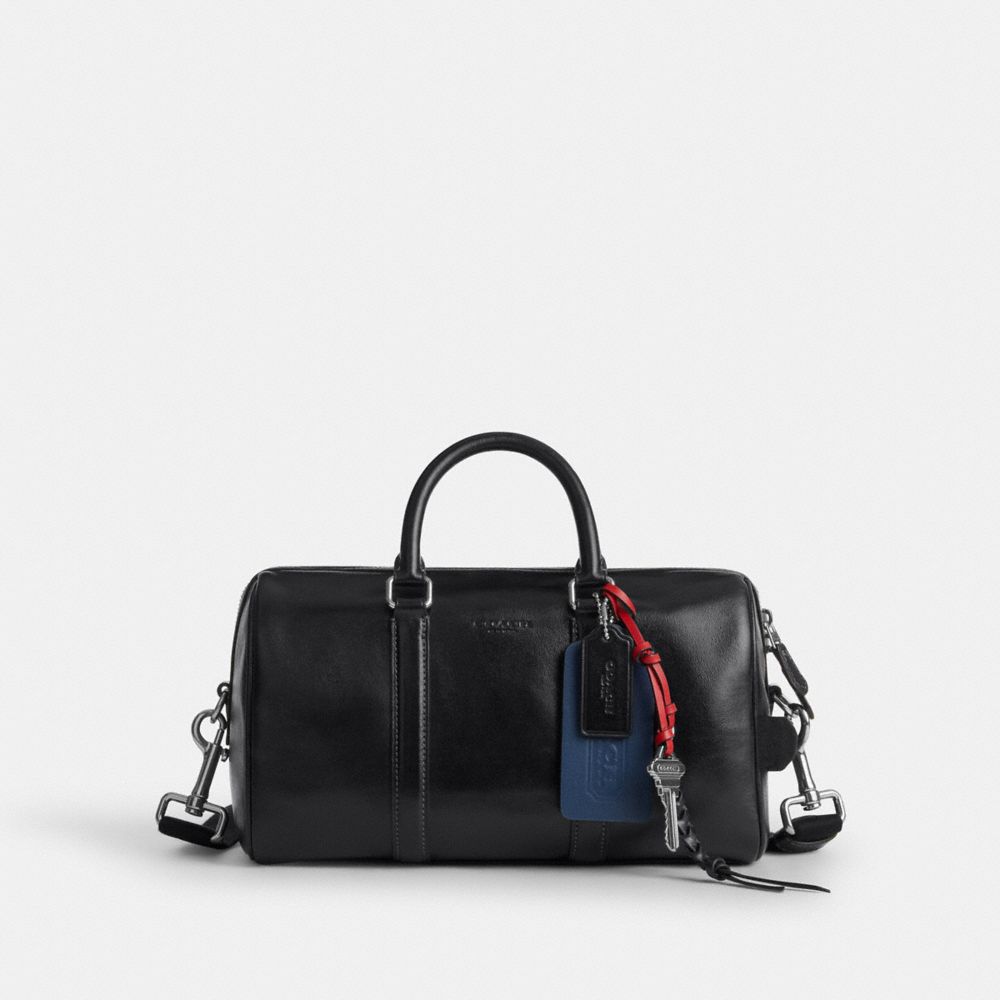 VENTURER DUFFLE BAG 27 WITH CHARMS