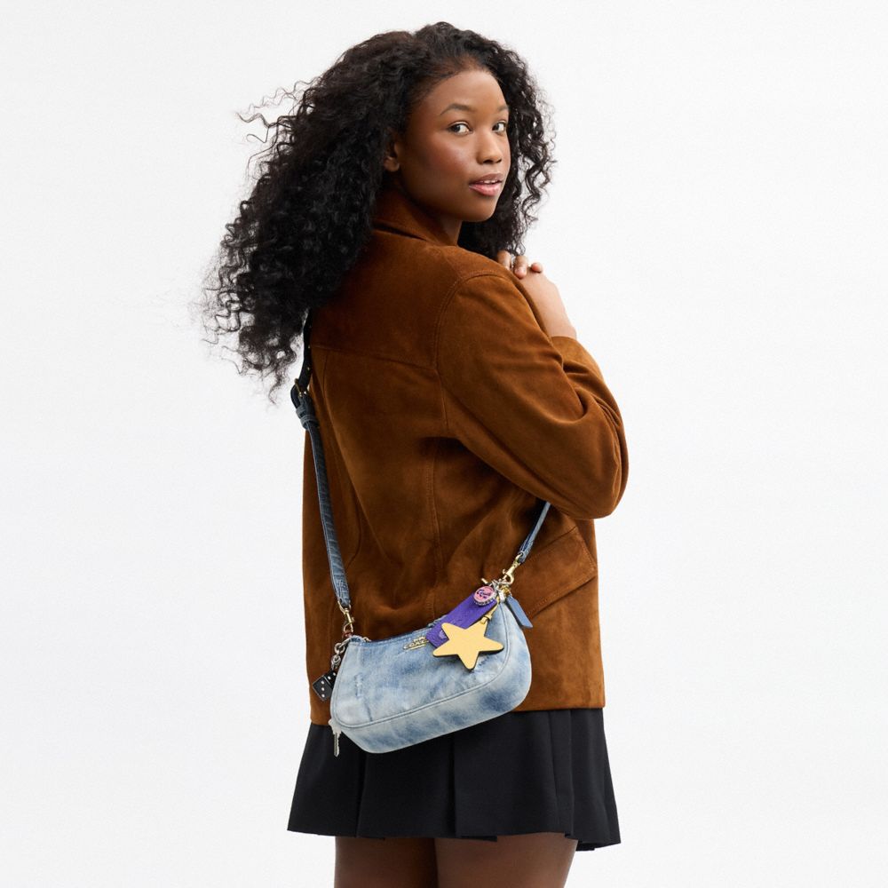 TERI SHOULDER BAG IN LOVED DENIM WITH CHARMS