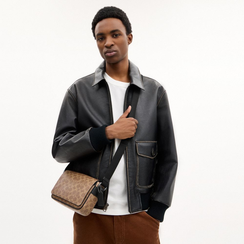 JACK SMALL FLAP CROSSBODY BAG IN SIGNATURE CANVAS