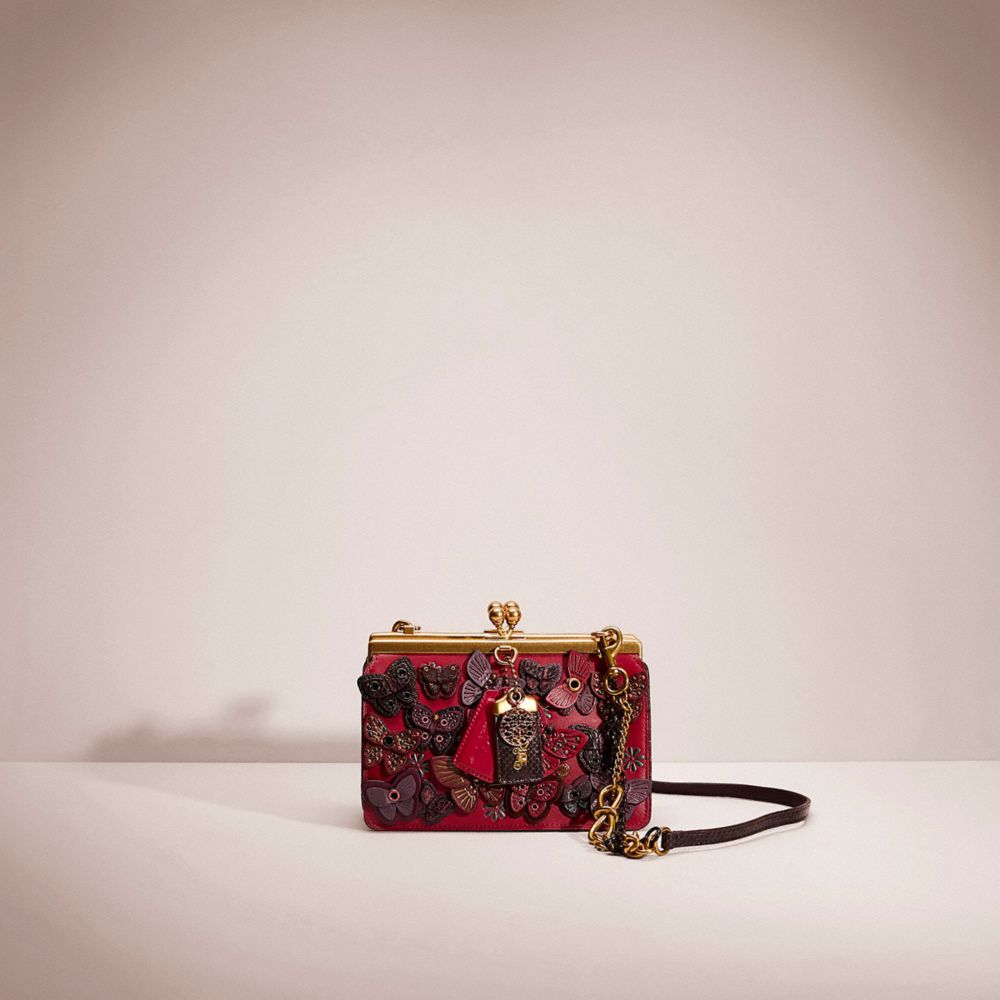 CE106 - Upcrafted Double Frame Bag 19 With Butterfly Applique And Snakeskin Detail Brass/Bright Cherry