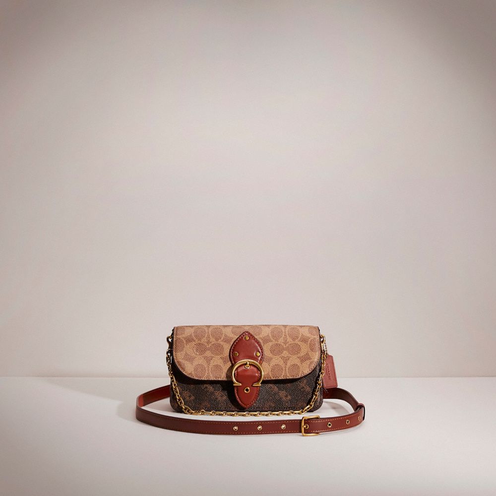 CE393 - Restored Beat Crossbody Clutch In Signature Canvas With Horse And Carriage Print Brass/Tan Truffle Rust