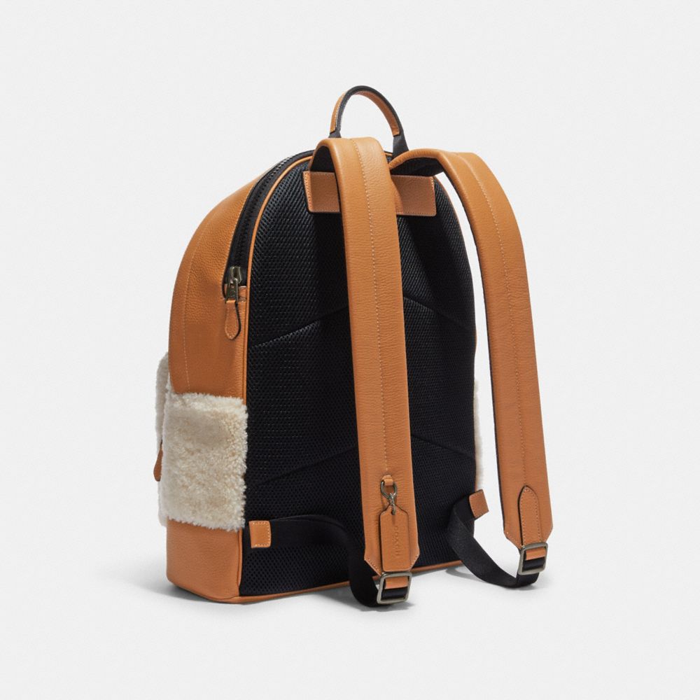 WEST BACKPACK WITH COACH MOTIF