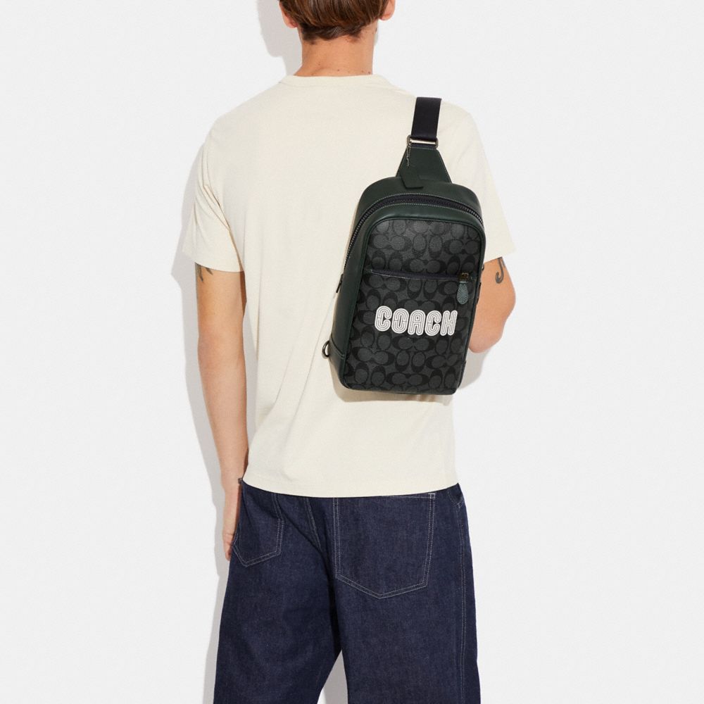 WESTWAY PACK IN COLORBLOCK SIGNATURE CANVAS WITH COACH PATCH