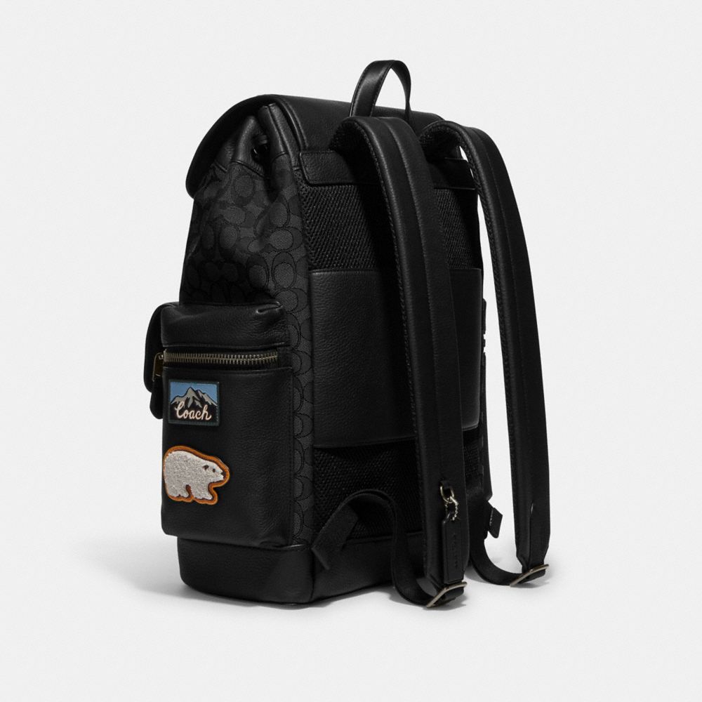 SPRINT BACKPACK IN SIGNATURE JACQUARD WITH SKI PATCHES
