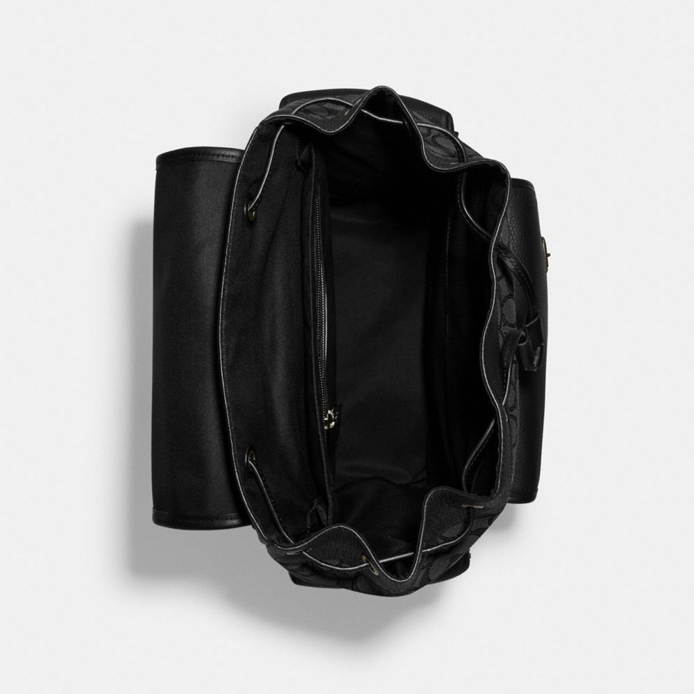 SPRINT BACKPACK IN SIGNATURE JACQUARD WITH SKI PATCHES